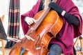 Young girl playing cello, close-up. music concert Royalty Free Stock Photo