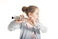 Young girl playing flute Royalty Free Stock Photo