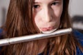 Young girl playing flute Royalty Free Stock Photo