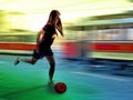 Young girl playing football Royalty Free Stock Photo