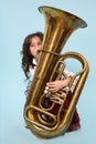 Young girl playing the horn Royalty Free Stock Photo
