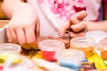 Young girl playing and making handmade art