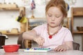 Young Girl Playing at Montessori/Pre-School Royalty Free Stock Photo