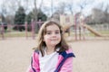 Beautiful 5-year Old Girl Playing Outside on a Playground Royalty Free Stock Photo
