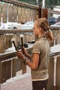 Young girl playing percussion musical instrument