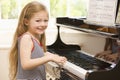 Young Girl Playing Piano Royalty Free Stock Photo