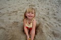 Young girl playing in sand Royalty Free Stock Photo