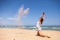 Young girl playing with sand. Royalty Free Stock Photo