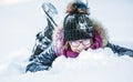 Young girl are playing with snow.Beauty Winter happy Girl Blowing Snow in frosty winter park or outdoors. Royalty Free Stock Photo