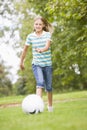 Young girl playing soccer Royalty Free Stock Photo