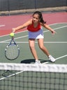 Young girl playing tennis Royalty Free Stock Photo