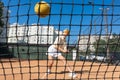 Young girl playing tennis at the court. Female tennis player hitting the ball. Sports woman reaching to hit the tennis Royalty Free Stock Photo