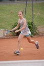 Young girl playing tennis Royalty Free Stock Photo