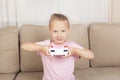 Young girl playing video game Royalty Free Stock Photo