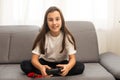 young girl playing video games on white. High quality photo Royalty Free Stock Photo