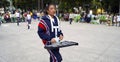 Young girl plays lyre in a march band