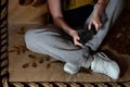 A young girl plays video games with a black joystick with many b Royalty Free Stock Photo