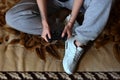 A young girl plays video games with a black joystick with many b Royalty Free Stock Photo