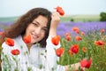 Young girl portrait is in the lavender field, beautiful summer landscape with flowers Royalty Free Stock Photo