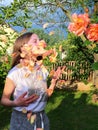 Young girl in the rose garden