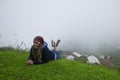 Young girl posing on a high plateau