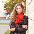 Young girl posing near wall. Summer time