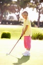 Young Girl Practising Golf Royalty Free Stock Photo