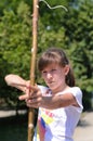 Young girl practising her archery