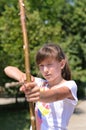 Young girl practising her archery
