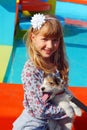 Young girl with puppy outdoor