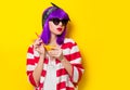 Girl with purple hair holding lemonade cocktail Royalty Free Stock Photo