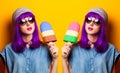 Young girl with purple hair and ice-cream toy Royalty Free Stock Photo