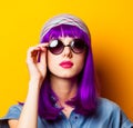 Young girl with purple hair and sunglasses Royalty Free Stock Photo