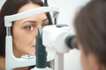 Young girl puts on contact lenses Royalty Free Stock Photo