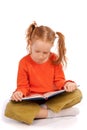 Young girl reading a book