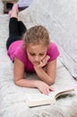 Young girl reading book Royalty Free Stock Photo