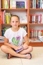 Young girl reading a book. Royalty Free Stock Photo