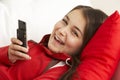 Young Girl Reading Text Message Royalty Free Stock Photo