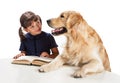 Young girl reading to her dog Royalty Free Stock Photo