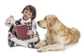 Young girl reading to her dog Royalty Free Stock Photo