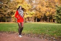 Young girl in a red coat Royalty Free Stock Photo
