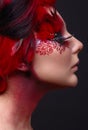 Young girl with red hair and creative ingenious makeup Royalty Free Stock Photo