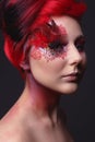 Young girl with red hair and creative ingenious makeup Royalty Free Stock Photo