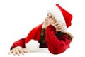 Young girl in red Santa hat, looking up Royalty Free Stock Photo