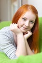 Young girl relaxing on couch Royalty Free Stock Photo