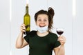 Young girl relaxing at home and drink wine. Cozy time at home. Self time and Coronavirus outbreak quarantin, isolated