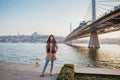 young girl relaxing on the side of bosphorus during sunset Royalty Free Stock Photo