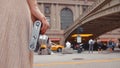 Young girl with a retro camera at the railway station in New York Royalty Free Stock Photo