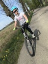 Young girl riding a bike in Polish countryside Royalty Free Stock Photo