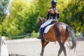Young girl riding horse on equestrian competition Royalty Free Stock Photo